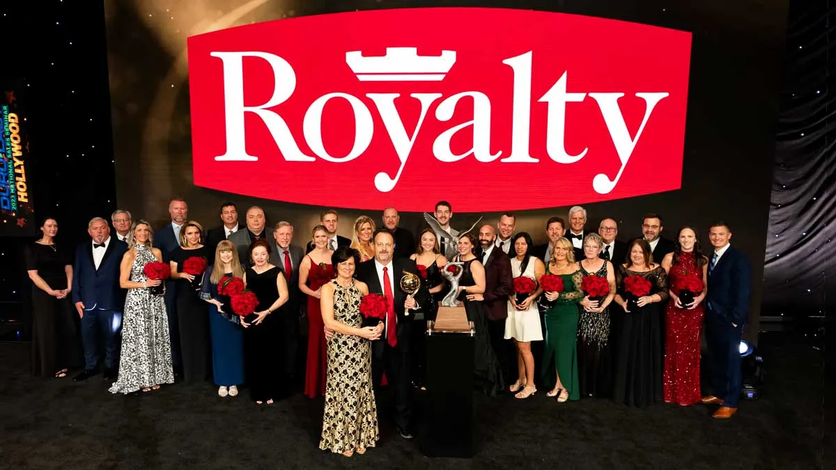 Royalty team holding award at the Durolast Convention